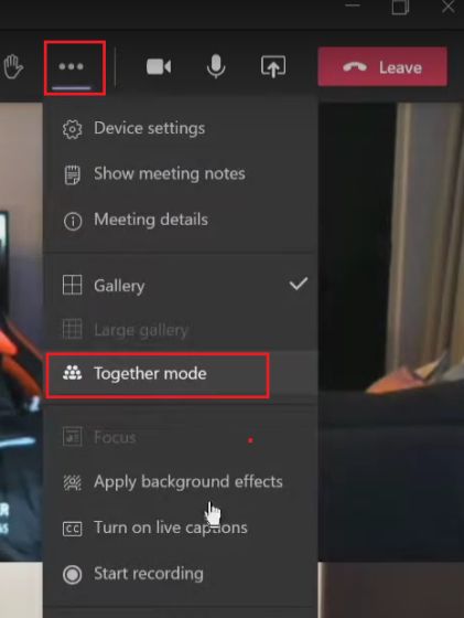 Screenshot of the Microsoft Teams meeting menu opened from the three-dot button, listing Device settings, Show meeting notes, Meeting details, Gallery, Large gallery, Together mode (outlined in red), Focus, Apply background effects, Turn on live captions and Start recording.
