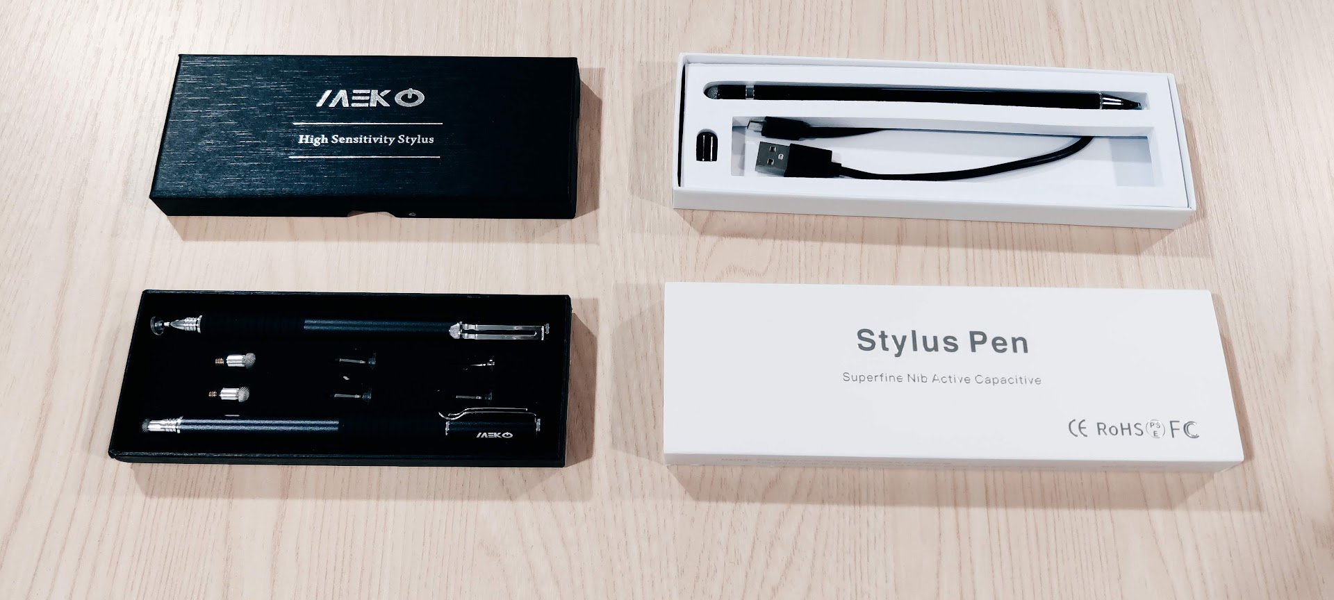 Photograph of boxed passive styluses with soft and fine tips.