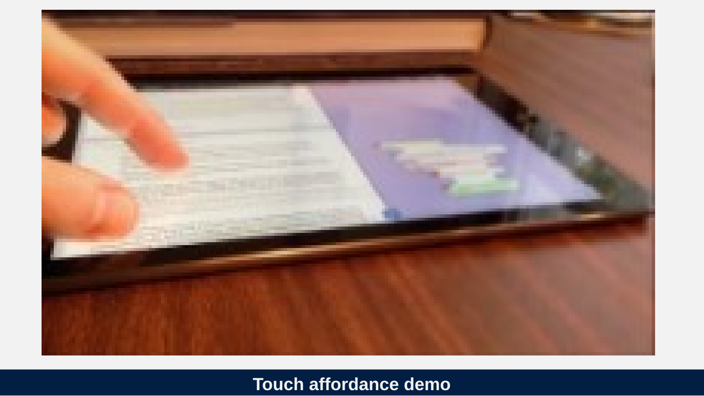 Original slide 77 as rendered: a frame of a video of a finger touching a tablet screen. The video is not part of this package.