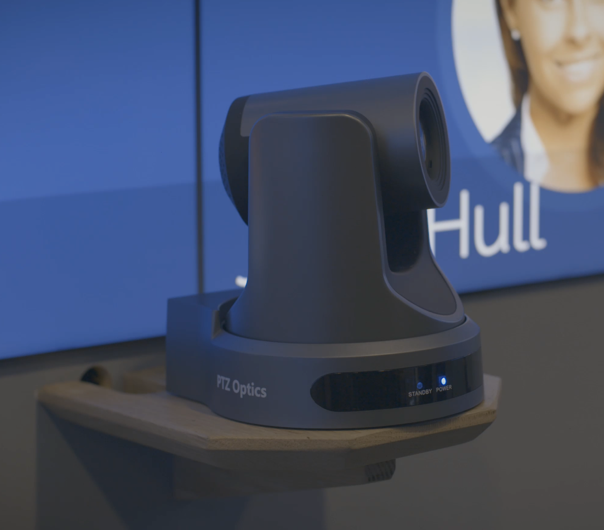 Close-up of a conference camera on a stand.
