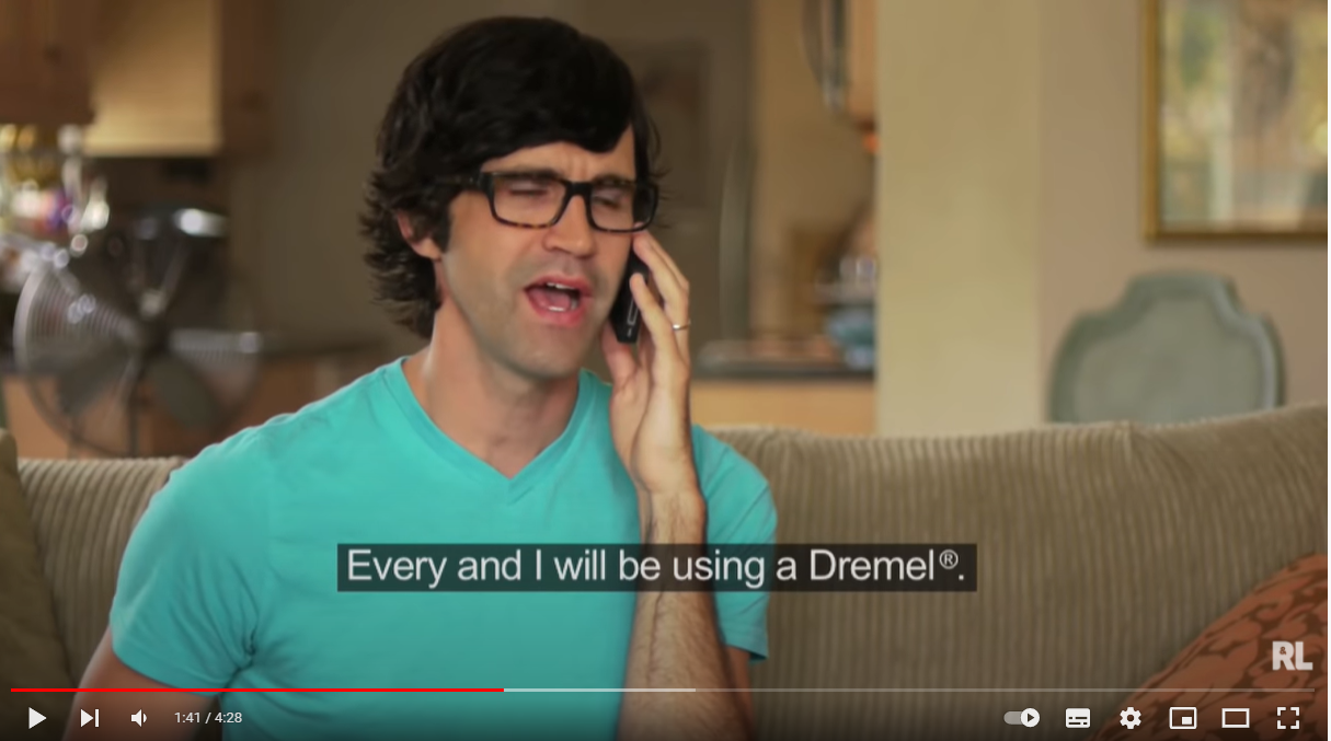 Second frame of the same video: the man holding a phone to his ear, with a caption that misrecognises his words.