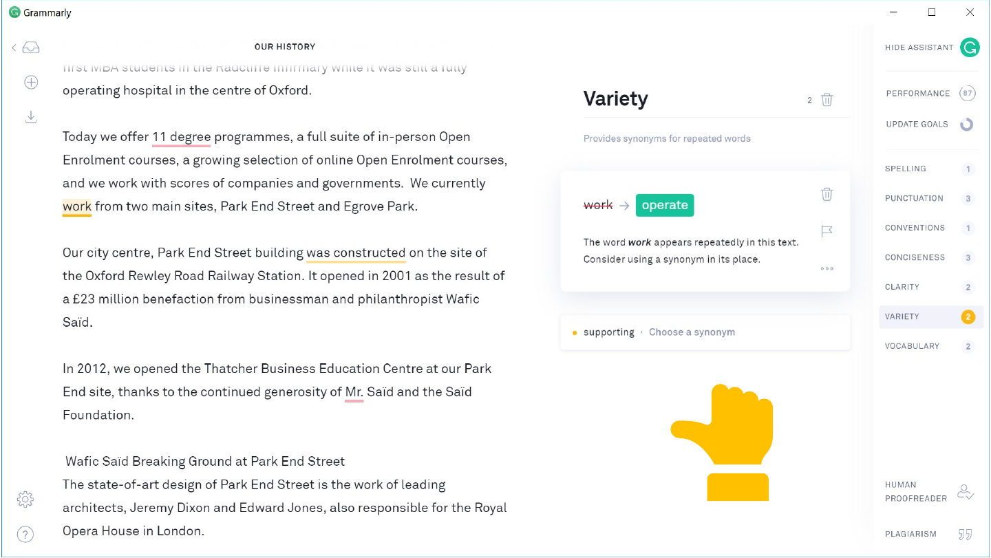 The slide's original page: a Grammarly window with the document “Our history” on the left and a “Variety” panel open, suggesting “operate” as a synonym for the repeated word “work”. At the lower right of the page is a yellow hand icon turned sideways, its thumb pointing left, its fingers curled up and its cuff below; it is neither thumbs-up nor thumbs-down.