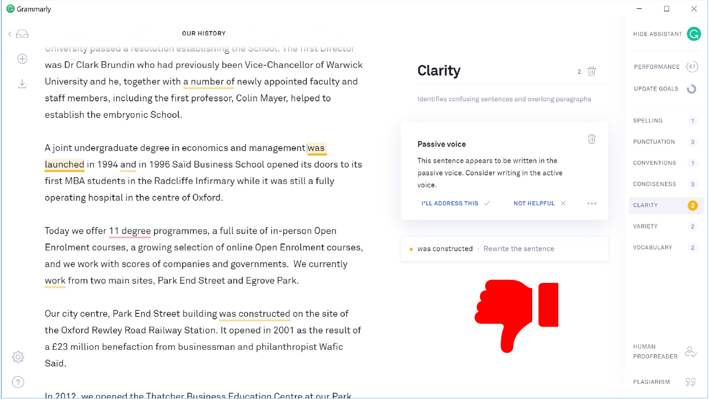The slide's original page: a Grammarly window with the document “Our history” on the left and a “Clarity” panel open, flagging “was constructed” as passive voice. At the lower right of the page is a red thumbs-down icon: a red hand with its thumb pointing down and its cuff on the right.