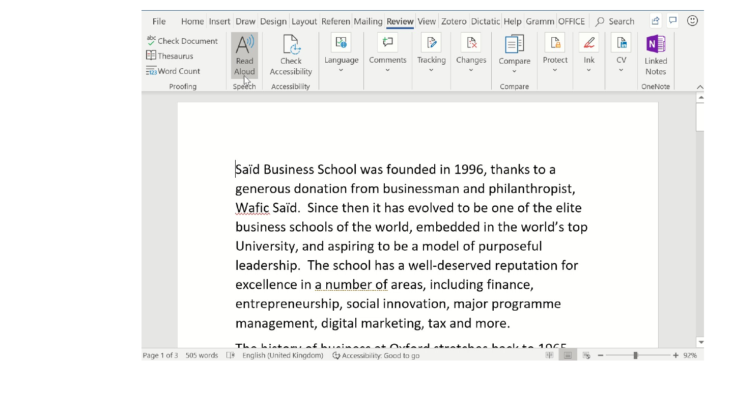 The slide's original page: a Microsoft Word window with the Review tab open and the Read Aloud button highlighted above a paragraph of the history text. The slide holds a screen recording (video) of this feature, which this package does not carry.