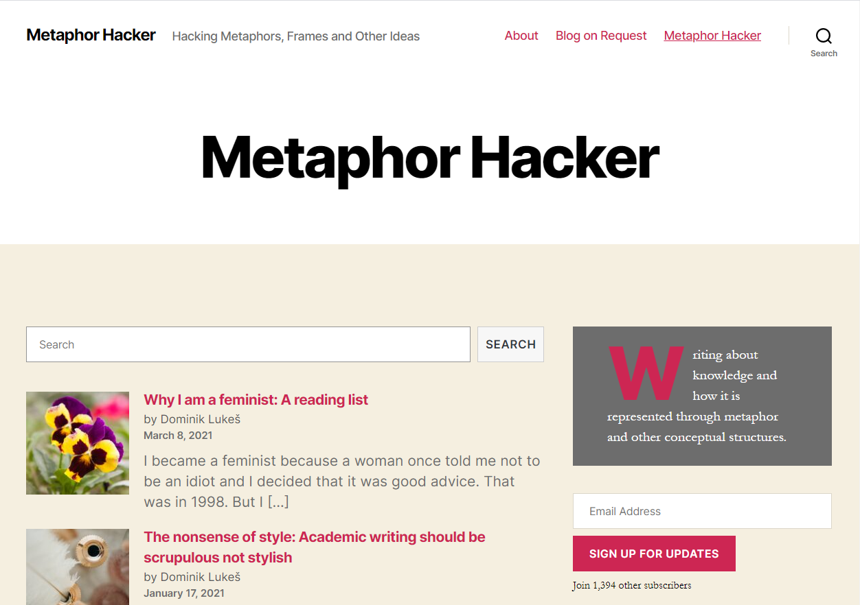 Screenshot of the Metaphor Hacker website, "Hacking Metaphors, Frames and Other Ideas", with its menu (About, Blog on Request, Metaphorhacker), a search box, and a list of posts beginning with "Why I am a feminist: A reading list" by Dominik Lukeš, March 8, 2021.